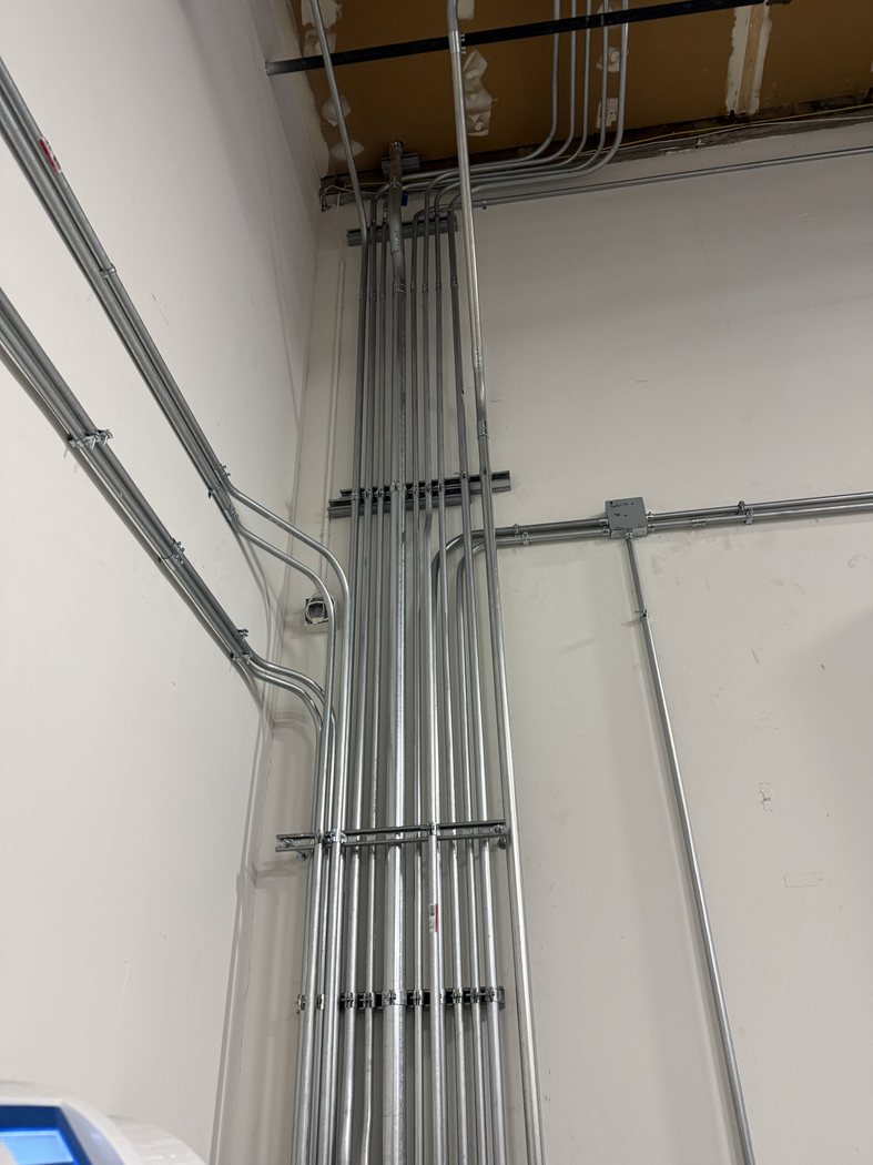 Commercial conduit routing for equipment power