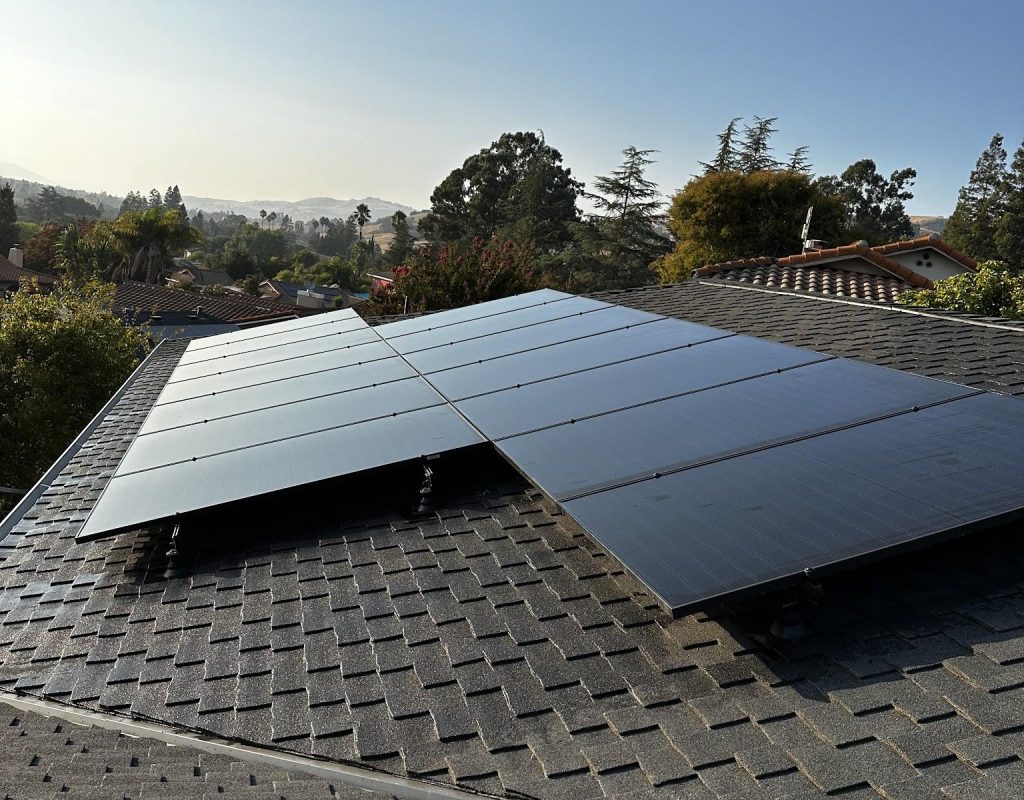 Electrician installing rooftop solar panels in Los Gatos, CA