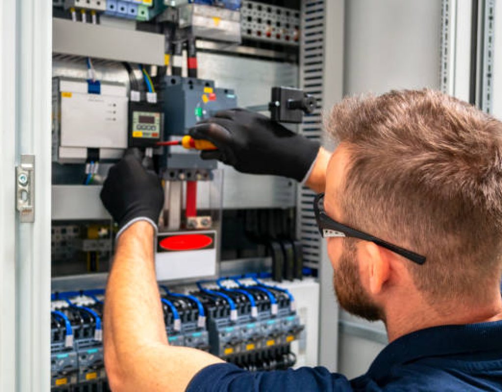 BNV Electric Inc electrician repairing electrical panel in San Jose