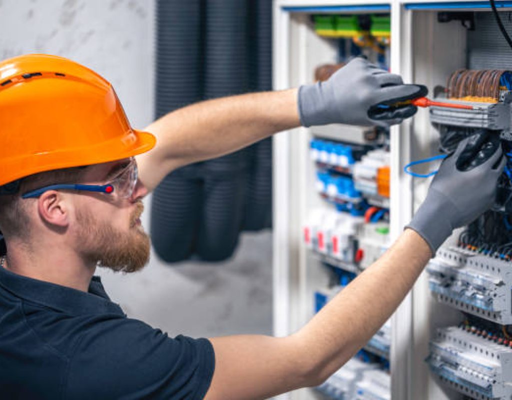 Electrician replacing a residential electrical panel in Morgan Hill, CA